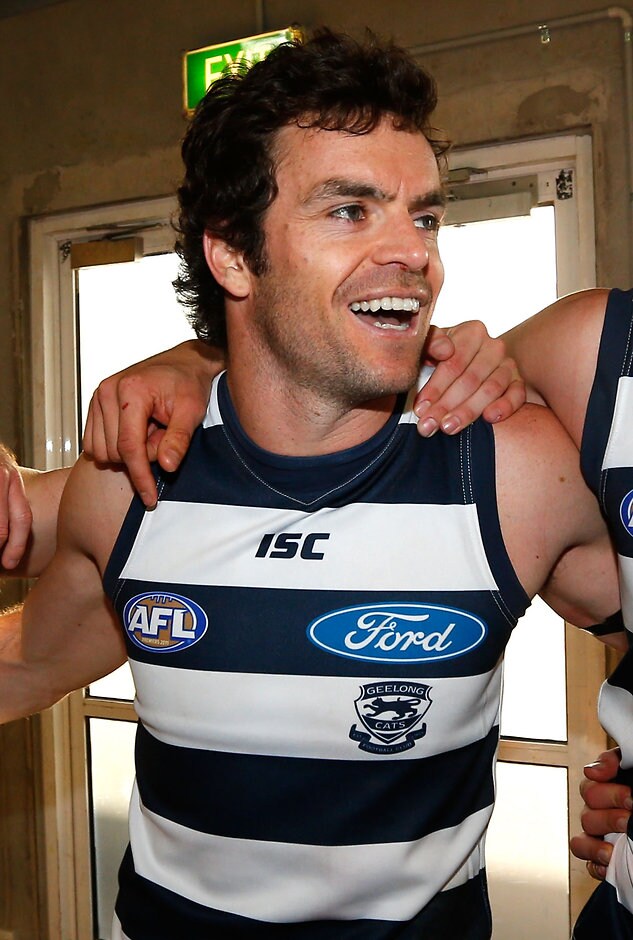AFL 2012 Rd 23 - Geelong v Sydney Matthew Scarlett of the Cats sings the team song after the AFL Round 23 match between the Geelong Cats and the Sydney Swans at Simonds Stadium, Geelong. (Photo: Michael Willson/AFL Media)